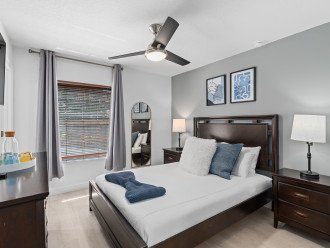 Master Bedroom with Mickey Magic: Experience the enchantment of Disney's iconic Mickey Mouse in the heart of your relaxing retreat, where comfort meets whimsical charm.