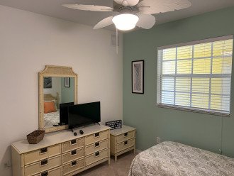 Dresser and television in second bedroom