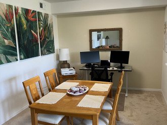 Dining area and small office desk with dual monitors for your use