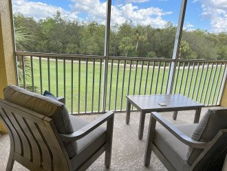 Brand new outdoor furniture on patio overlooking golf course from 3rd floor