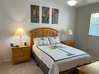 Master bedroom with queen bed with new Tommy Bahama bedding