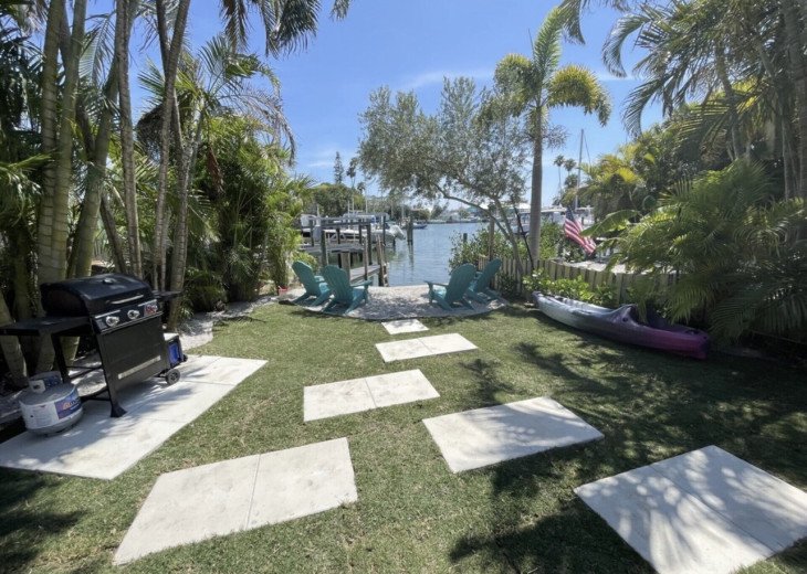 Semi Private yard on saltwater cove. Shared dock and manatees/dolphins awaits