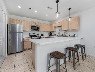 Kitchen counter top with 3 stools