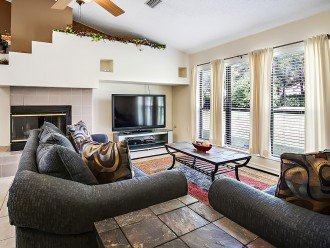 Comfortable living room for entertaining with large flat screen TV