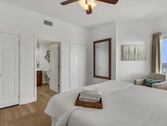 This bedroom features two large closets and its own bathroom right off the room