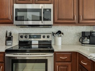 Updated kitchen with brand new counters & backsplash! Dual coffee maker!