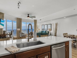 Fully updated kitchen and counters with a view of the ocean while you cook!