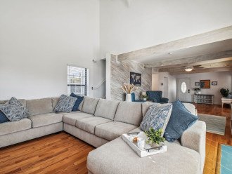Great room w/ high ceilings, huge sectional sofa. Gather the crew for movies!