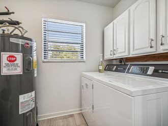 Laundry room; full-size water heater, state-of-the-art washer & dryer.