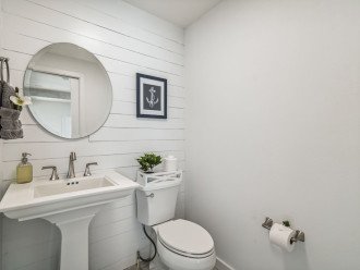 Main living (2nd floor) half-bath. Soothing coastal decor throughout this home.