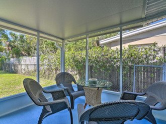 Step out to the screened-in patio to relax in the protected interior.