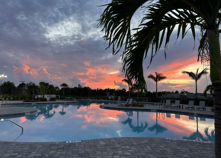 Resort Pool At Sunset