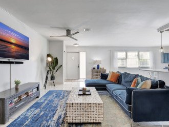 The living room with comfortable sofa and large Smart TV