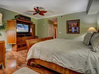 Master Bedroom features large entertainment center