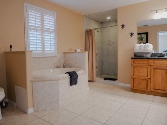 Master bath offers soaker tub and shower