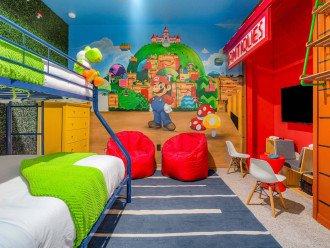 The Mario's World Bedroom is a twin over a double bunkbed.