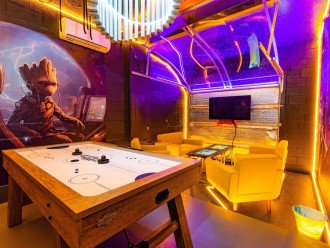 Our Guardians in Galaxy Game room has A/C, Air-Hockey and 2 Arcade Infinity Games!
