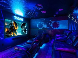 Tron movie theater upstairs is a perfect place to kick back and enjoy a movie.