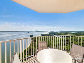 9th Floor Corner Balcony With Estero Bay Sunrise Views | Remodeled Kitchen