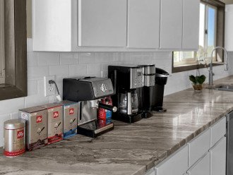 Espresso machine with ESE pods, regular coffee pot, and a Keurig.