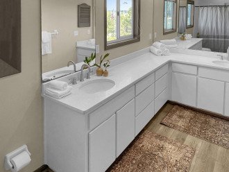 Indulge in luxury and brightness with this double sink bathroom, featuring chic and elegant decor.