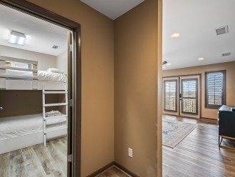 Enjoy comfortable and practical sleeping arrangements with these bunk beds in an enclosed room within the lower floor Master bedroom suite. Perfect for a small family with little ones to retreat into their suite.