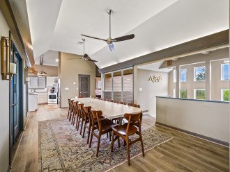 Create new memories with friends and loved ones in this bright dining area that can comfortably seat 14 people. There are 10 additional dining places in the kitchen and 6 in the screened-in porch.