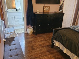 master bedroom with king bed, full shower and toilet bedroom 1