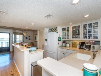 Open modern kitchen with Upgraded with view of ICW and Ocean