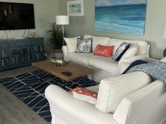 Living Room with 75 " Samsung TV, windows to let sun light in