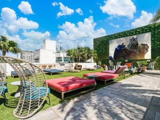 Outdoor movie theater with film showings every Wednesday and Saturday nights. Life size chess pieces and other games are great for the kids while the adults sip on drinks.