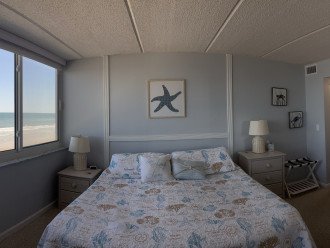Spread out in the master bedroom with full ocean view and private bathroom.