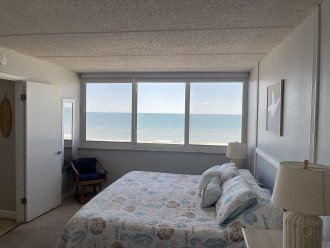 Stunning views of the ocean while relaxing in bed.