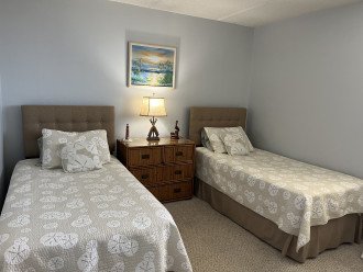Guest bedroom with comfortable twin beds.