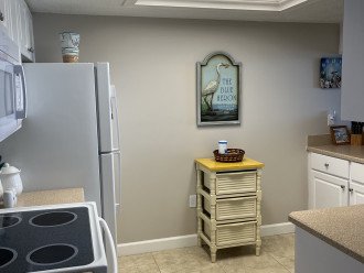 Complete kitchen w/dishwasher, microwave, stove, refrigerator, & full utensils.