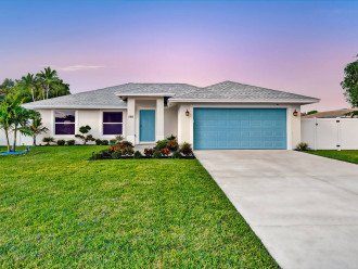 The front of your next newly constructed retreat! With a bright blue door and garage door to stand out, you can’t miss it! The moment you arrive here you will be comfortably invited by the green luscious grass with the front garden.