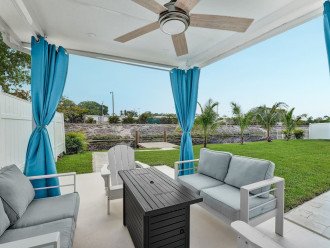 Sit up at this comfortable outdoor covered lounge area and enjoy the times with your loved ones.