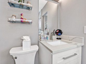 Head on into your ensuite with a small vanity area with enough room for your lotions and potions throughout your stay