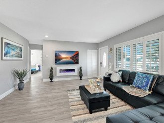 The living room area is a large and spacious space creating an airy feeling throughout.