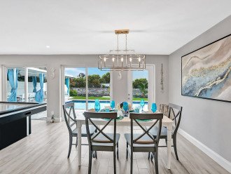 Take your kitchen creations over to the dining table and enjoy creating memories within this beautiful home with your backyard paradise waiting for more fun.