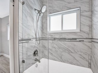 This bathroom also has a bathtub shower combination - take your pick of which you prefer and enjoy the luxury of having your own private bathroom, with stunning tiles throughout to add to the experience.