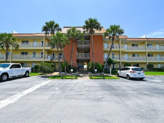Main entrance and parking to our first floor condo