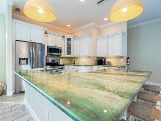 This ocean inspired granite countertop allows for easy food prep.