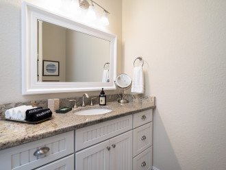 Each bathroom is stocked with a hairdryer, magnified mirrors and hand soap