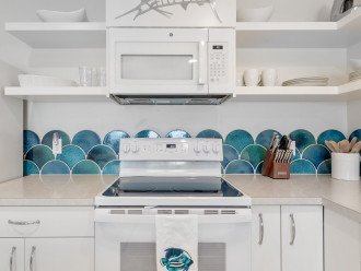 White cottage kitchen with open shelving