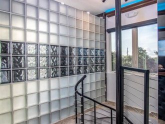 This glass block wall greets you upon entering the Penthouse Suite
