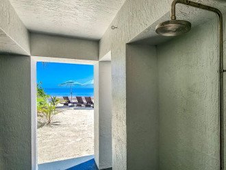 Shower off before heading inside after your day at the private beach