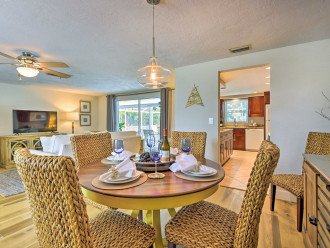 The over-size kitchen comes fully stocked and gives access to the lanai.