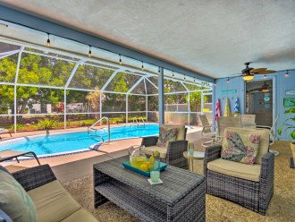Covered lanai with plenty of seating for entertaining