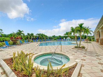 Bask in the Florida sunshine and take a refreshing dip in our sprawling community pool, a central spot for relaxation and fun.